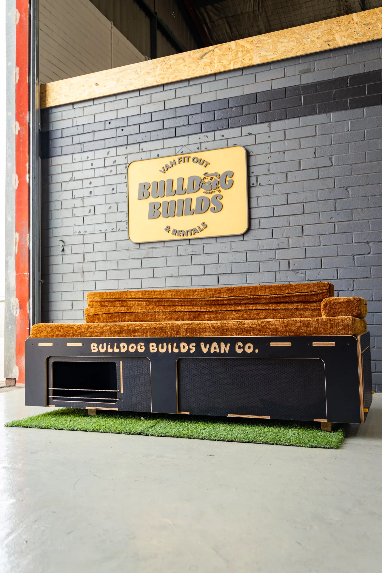 Pre-built Bulldog Builds campervan kit module in the workshop showroom